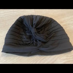 Simple black stretch beanie.